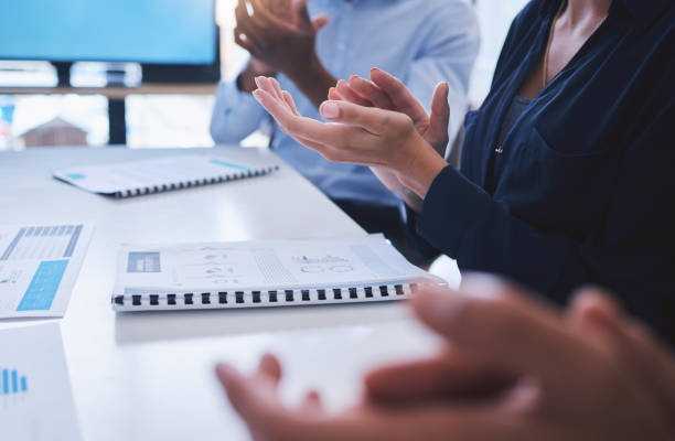 clapping, teamwork training and workshop in presentation, business conference or office tradeshow. zoom on diversity hands, motivation or people success for innovation or company education with paper - training business seminar clapping imagens e fotografias de stock