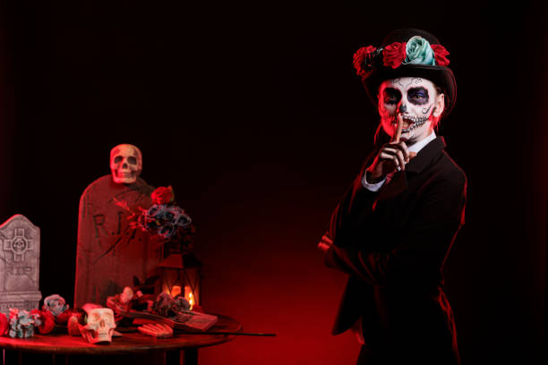 istock Santa muerte doing hush secret sign 1434910166