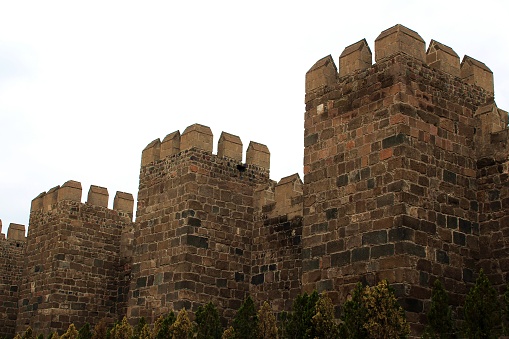 Kayseri Castle is a castle built in antiquity and first mentioned in a coin during the rule of Gordian III between 238 and 244 AD. It went through multiple additions starting with the Romans and continuing with the Byzantines, Danishmends, Seljuqs, Dulqadirs, Karamanids, and Ottomans.