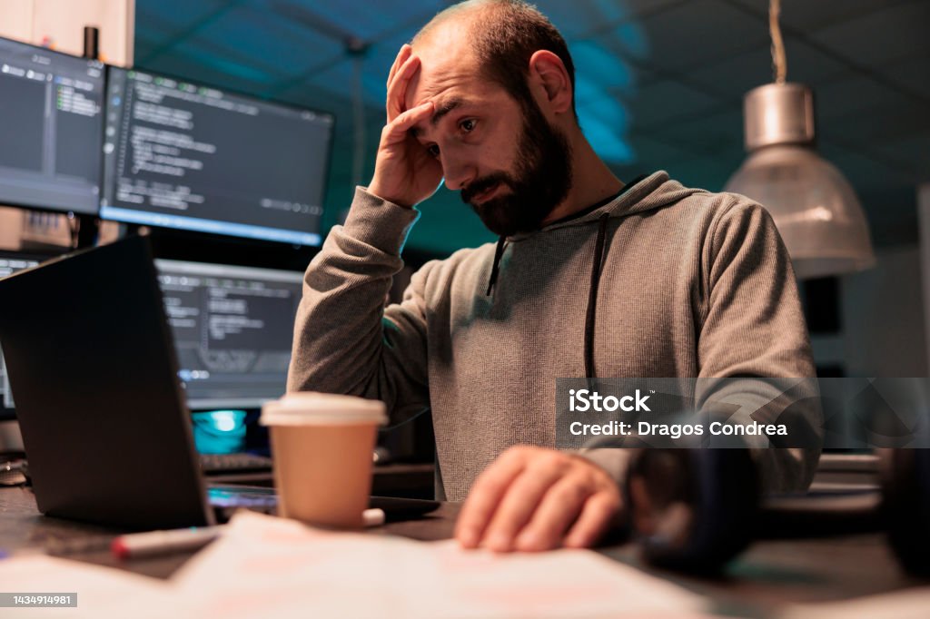 Coder Hunched Over Computer Stressed Overworked Developer Programming Html Code Stock Photo ...