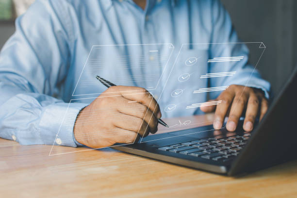 istock electronic signing electronic signature document management Businessman signing electronic documents on digital documents on laptop screen paperless workplace concept 1434916718