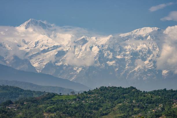 istock Tree-covered hills before the Annapurna Himalayan mountain range in Pokhara 1434917061