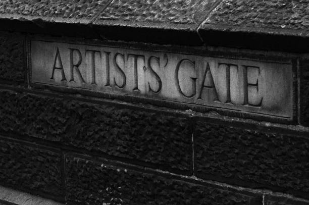 istock Closeup of 'artists' gate' text on stone 1434917420