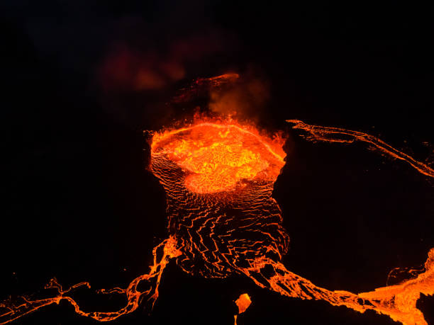 istock Beautiful aerial view of an Active Volcano with exploding red Lava in Iceland 1434918154