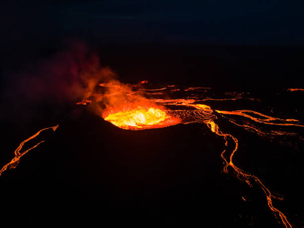 istock Beautiful aerial view of an Active Volcano with exploding red Lava in Iceland 1434918178