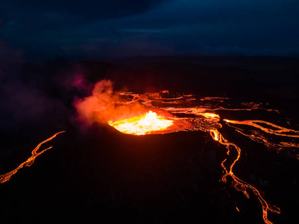 istock Beautiful aerial view of an Active Volcano with exploding red Lava in Iceland 1434918253