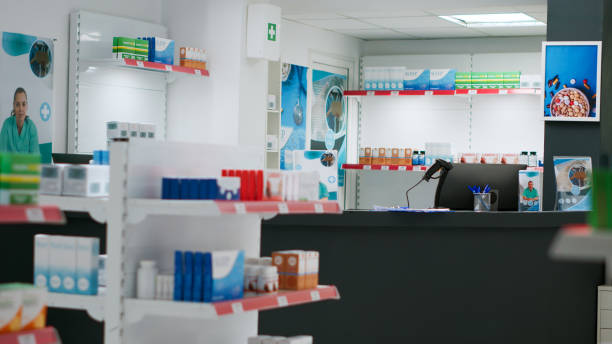 istock Empty pharmacy retail store with medicaments and treatment on shelves 1434919329