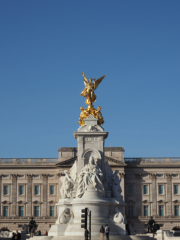 London, England - Sep 7, 2021: Queen Victoria Memorial in front of Buckingham Palace at London, England. Golden angel.