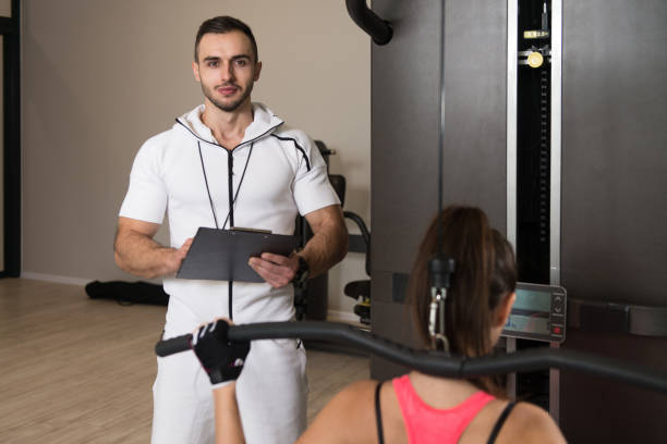istock Fit Couple Together Training Back On Machine 1434924615