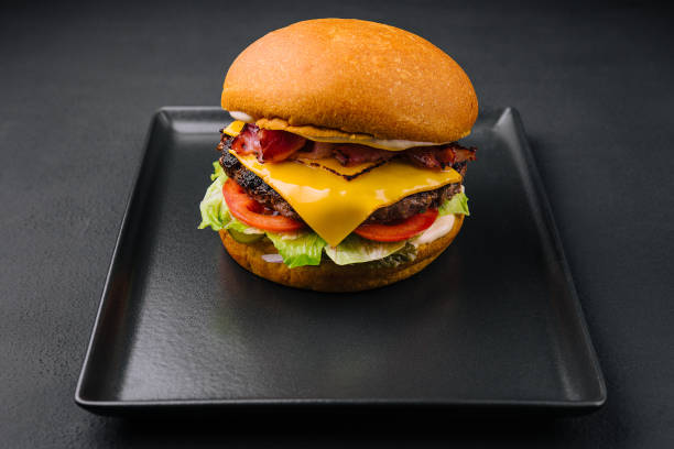 istock Bacon burger with beef patty on black tray 1434926255