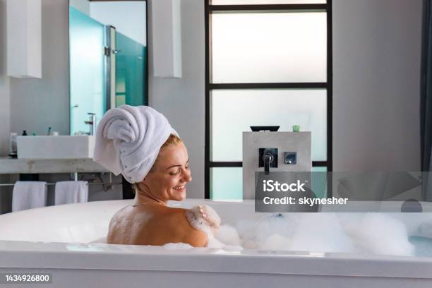 Young Happy Woman Enjoying In Bubble Bath Stock Photo - Download Image Now - Adult, Adults Only, Bathroom