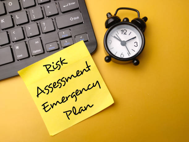 istock Wireless keybaord and clock with the word Risk Assessment Emergency Plan. 1434926866
