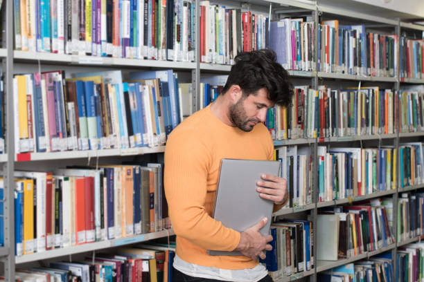 istock Male College Student Stressed About His Homework 1434929577