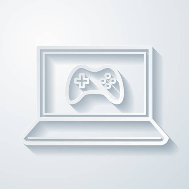 gra wideo na laptopa. ikona z efektem cięcia papieru na pustym tle - three dimensional shape joystick gamepad computer icon stock illustrations