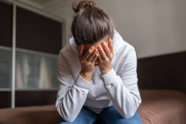 Depressed Lonely Woman Covered Her Face With Both Hands