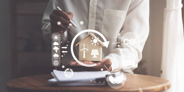 istock Real Estate Agent showing a energy project for future house. Green energy development concept 1434937513