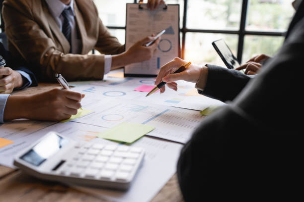 istock Group of fund manager analyzing big data for future investment 1434938320