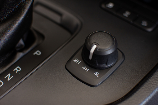 Two-wheel and four-wheel drive system adjustment knobs for off-road. Technology for driving comfort