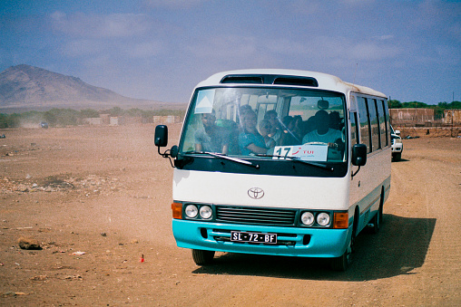 Group of tourists inside of a tour bus in the middle of Sal, Cape Verde