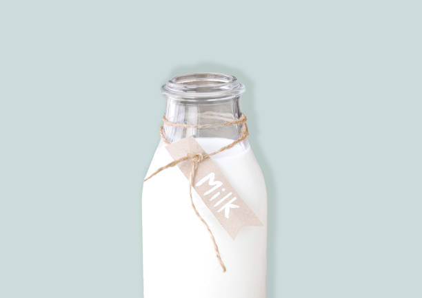 istock Milk Glass Bottle on Blue Background 1434947606