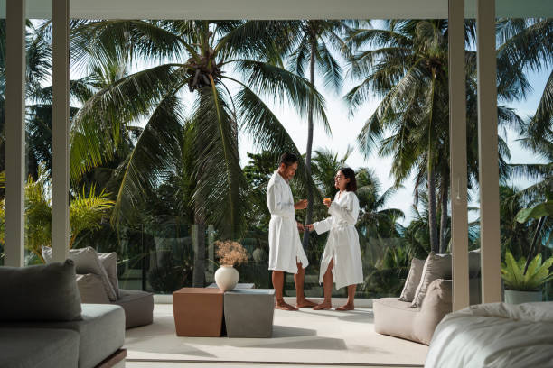 Smiling couple relaxing on a balcony
