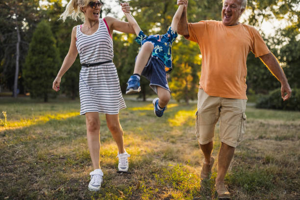 istock Multi-generation family having fun in a public park 1434952369
