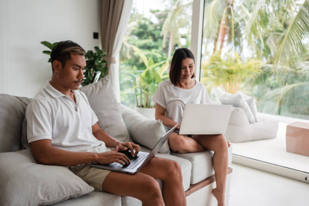 istock Couple is working remotely on their travel 1434952387