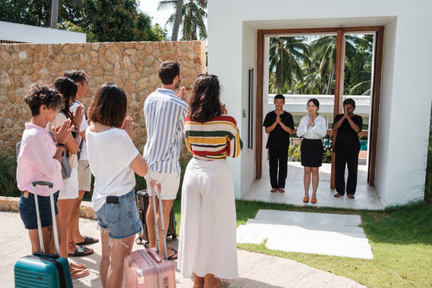 istock Hosts are greeting the group of tourists 1434953785