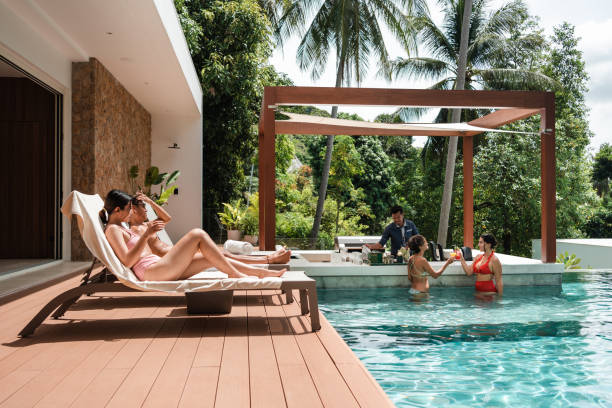 istock Friends enjoying vacation in a luxury villa 1434955039