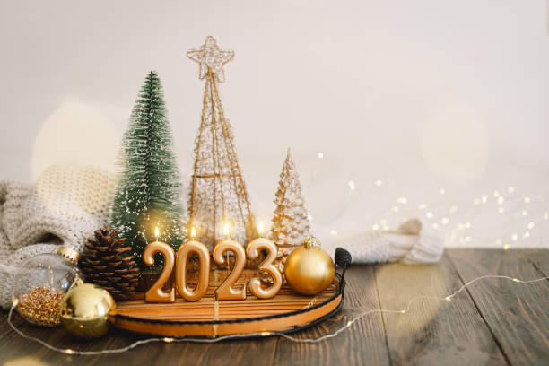 Happy New Years 2023 Happy New Years 2023. Christmas background with fir tree, cones and Christmas decorations. Christmas holiday celebration. New Year concept. new years day photos stock pictures, royalty-free photos & images
