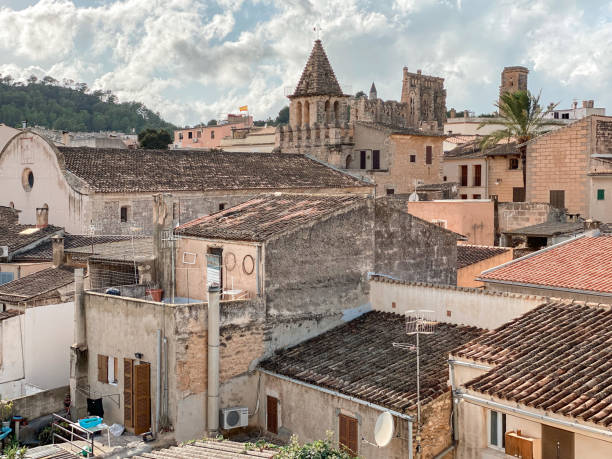 View of picturesque houses, windows and roofs of Son Servera, a town in Majorca