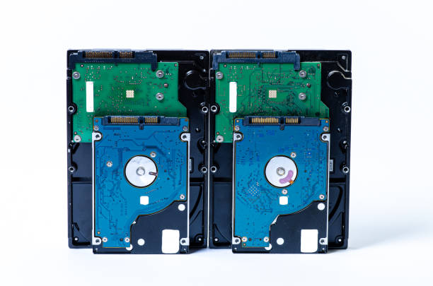 istock Hard disk drive HDD of different size isolated on white. 1434962105