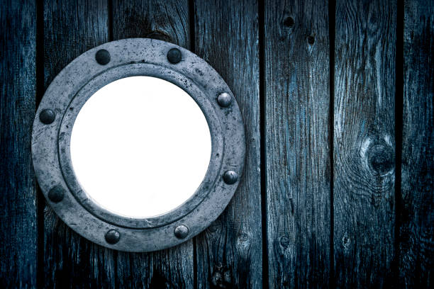 istock Empty Old Porthole Window on Blue Wooden Background 1434965236