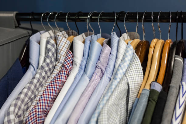 istock Mens shirts on a clothes hanger with a gaussian blurred background 1434965399