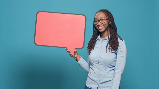 istock African american person holding mockup speech bubble 1434966344