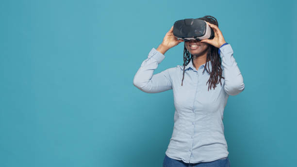 istock Portrait of woman using vr glasses on camera 1434968721