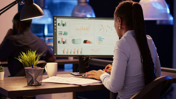 istock African american woman analyzing business charts on computer 1434979928