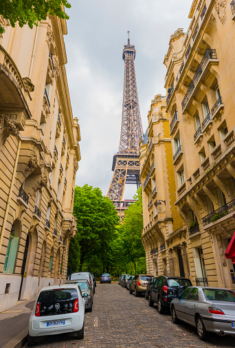 The Eiffel Tower from a residential street in Paris, France.