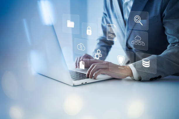 istock Document Management System DMS Online Database and automated processes to manage files in an organization effectively with ERP, enterprise business technology. businessman using virtual screen. 1434984110