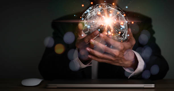 istock Businessman holding world map communication in life. Big data analytics and business intelligence concept. line composition of global business. Digital link tech. Global network connection 1434985710
