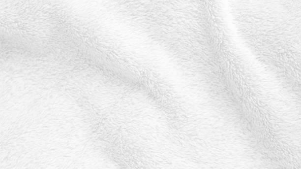 istock White clean wool texture background. light natural sheep wool. white seamless cotton. texture of fluffy fur for designers. white wool carpet, weaving industry, fabric shop, quality of winter fabrics 1434986915