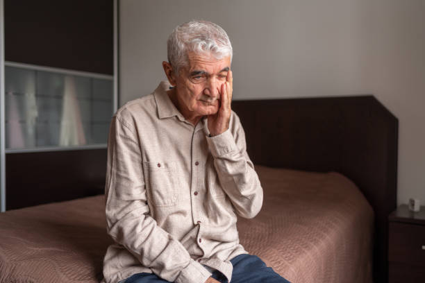 istock Worried Senior Man At Home 1434990033
