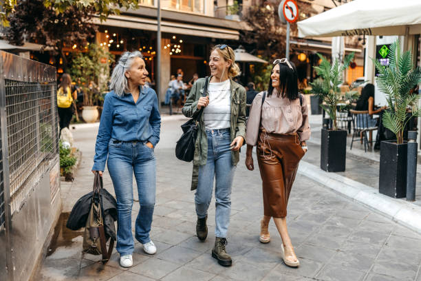 Female friends exploring city together