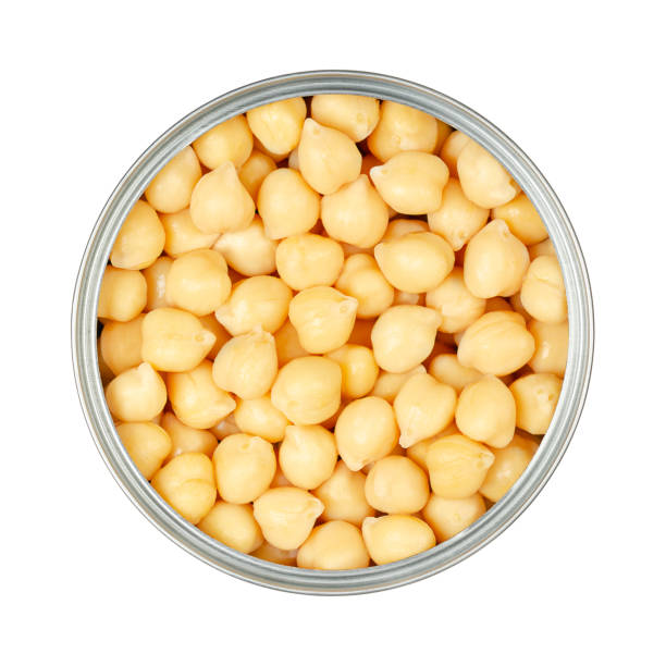 istock Chickpeas, canned chick peas, in an open can, isolated from above 1434996576
