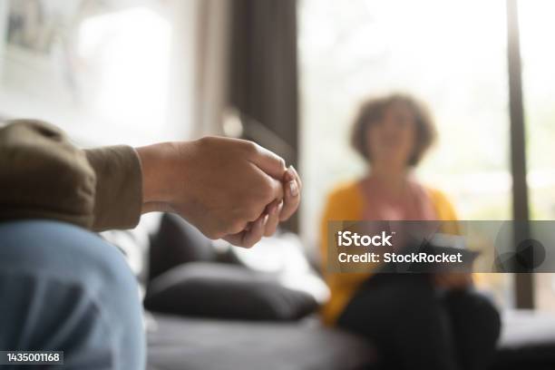 A Teen Girl In Psychotherapy Stock Photo - Download Image Now - Psychotherapy, Mental Health, Mental Health Professional