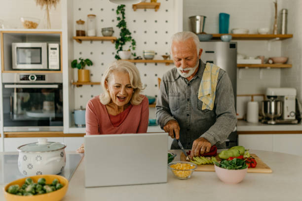 istock Checking online how to cook her favorite meal 1435001200