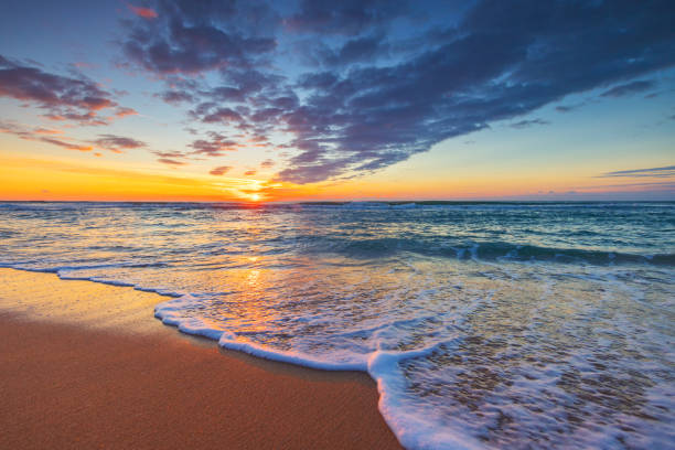 istock Beach sunrise over the tropical sea 1435002121