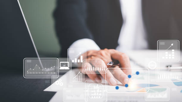 istock business people analyze data in marketing white paper with statistics from charts and graphs Management of business documents and financial and investment strategies. business growth consulting 1435003457