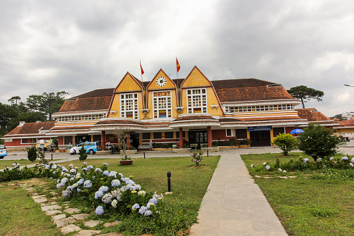 Da Lat, Vietnam - April 2016: The exterior facade of the French colonial era railway station in the city of Dalat.