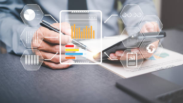 istock business people analyze data in marketing white paper with statistics from charts and graphs Management of business documents and financial and investment strategies. business growth consulting 1435004544